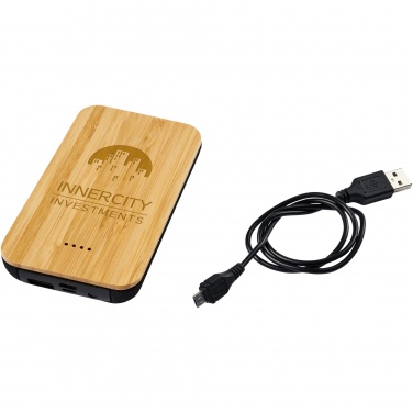 Logotrade ärikingid pilt: Tulevane 6000 mAh bambusest/kangast juhtmevaba akupank
