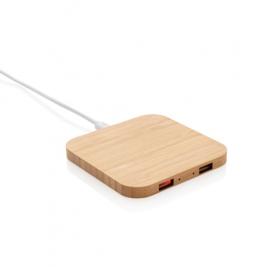Лого трейд pекламные cувениры фото: Беспроводное зарядное устройство Bamboo 5 Вт с USB-портом